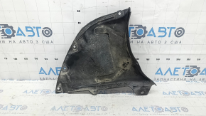 Right front bumper guard for Mazda 3 19-24 4d is torn and worn.