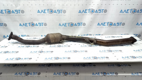 The Subaru Outback 15-18 exhaust pipe with catalytic converter is rusty.