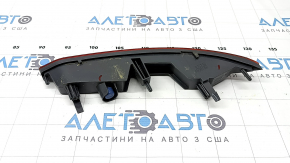 Jeep Grand Cherokee WL 21-25 right rear bumper reflector is worn