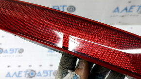 Jeep Grand Cherokee WL 21-25 right rear bumper reflector is worn