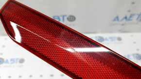 Jeep Grand Cherokee WL 21-25 right rear bumper reflector is worn