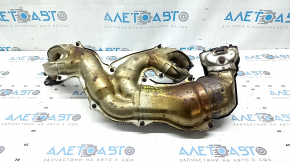 Rusty exhaust manifold with catalytic converter for a Subaru Outback 15-19
