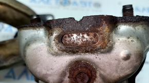 Rusty exhaust manifold with catalytic converter for a Subaru Outback 15-19
