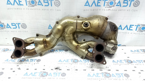 Rusty exhaust manifold with catalytic converter for a Subaru Outback 15-19