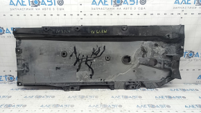 The front left underbody protection of the Mazda 3 19-24 is worn out.