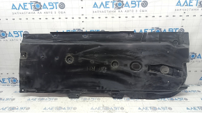 The front right underbody protection of a Mazda 3 19-24 is worn out.