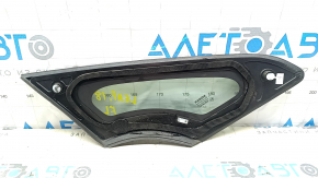 The front left window glass is blind and the seal is torn on a Nissan Leaf 18-24.