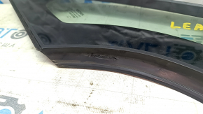 The front left window glass is blind and the seal is torn on a Nissan Leaf 18-24.