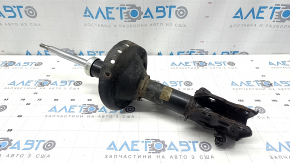 Rusty front left shock absorber for a 2015-2017 Subaru Outback