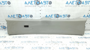 Upper plastic trim on the trunk door of a Lexus RX300 RX330 RX350 RX400h 04-09, gray, scratches, and whitened plastic