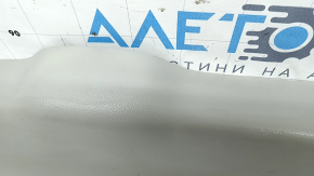 Upper plastic trim on the trunk door of a Lexus RX300 RX330 RX350 RX400h 04-09, gray, scratches, and whitened plastic