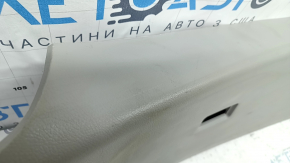 Upper plastic trim on the trunk door of a Lexus RX300 RX330 RX350 RX400h 04-09, gray, scratches, and whitened plastic