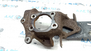 The rear left axle of a Ford Escape MK3 13-19 with a trailing arm is rusty.