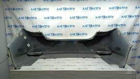Rear bumper naked Mazda 3 19-24 4d white, painted, dented, crepe cracked, paint peeling