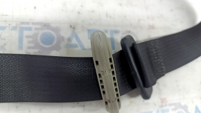 Rear left seat belt for a 1997 Dodge Grand Caravan, black, 2nd row, cracked