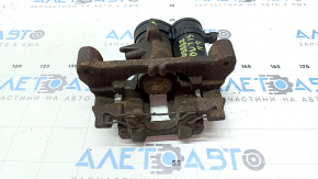 The rear right caliper assembly for a Subaru Outback 15-19 is rusty.