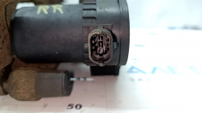The rear right caliper assembly for a Subaru Outback 15-19 is rusty.