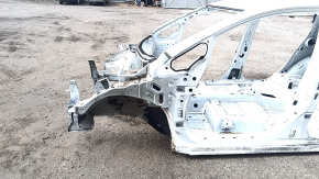 Front left quarter panel of a 18-19 Nissan Leaf on a white body QAK