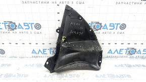 The front bumper guard on the left Mazda 3 19-24 4d is torn, worn, has cracks and tears.