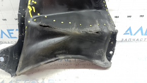 The front bumper guard on the left Mazda 3 19-24 4d is torn, worn, has cracks and tears.