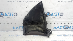 The front bumper guard on the left Mazda 3 19-24 4d is torn, worn, has cracks and tears.
