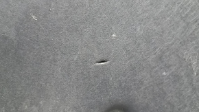 The hood insulation on a Toyota Camry V55 2015-2017 is torn.