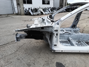 Front left quarter panel of Mazda 3 19-24, white, on the body, bumps