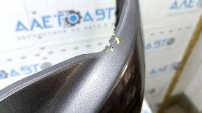 The front bumper of a Toyota Camry V55 2015-2017 (USA) is cracked, dented, and has scratches.