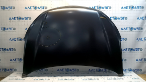 The bare hood of a Hyundai Santa FE Sport 13-18 steel, dents
