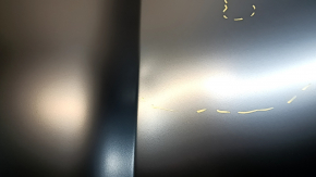 The bare hood of a Hyundai Santa FE Sport 13-18 steel, dents