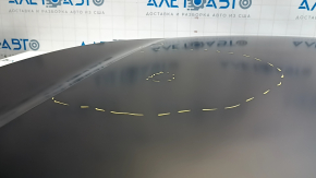 The bare hood of a Hyundai Santa FE Sport 13-18 steel, dents