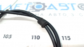 The rear hood release cable of a BMW X5 F15 14-18 has a torn seal.