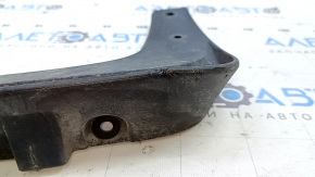The front left mudguard for a Kia Niro 17-18 HEV (PHEV) is dented, worn, and cracked.