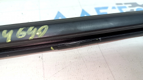 The door-glass molding, center rear right, Toyota Prius 50 16-22, is broken.