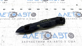The left front bumper mount for a Toyota Camry V55 15-17 USA has a broken latch.