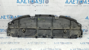 The front bumper guard of a Toyota Prius 50 16-18 is worn, scuffed, and the fastening is broken.