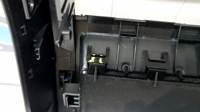 Rear center console trim BMW X5 F15 14-18 black, 2 pieces, crack in fasteners, broken fastener