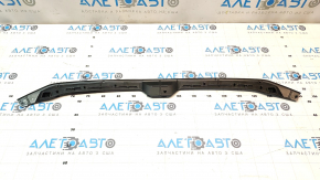 The central hood seal on an Audi A4 B9 17-25 is broken.