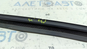 The rubber seal on the trunk door of a Toyota Venza 21-24 is worn out.