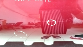 The front left door of a Toyota Venza 21-24 red 3T3 is bare, with bumps and a deformed corner.