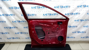 The front left door of a Toyota Venza 21-24 red 3T3 is bare, with bumps and a deformed corner.