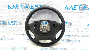The steering wheel is bare Hyundai Sonata 11-15 plastic, black, without buttons and overlays, tears