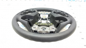 The steering wheel is bare Hyundai Sonata 11-15 plastic, black, without buttons and overlays, tears