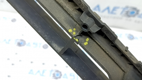 The lower grille of the front bumper of the Audi A4 B8 13-16 rest, S line, is cracked.