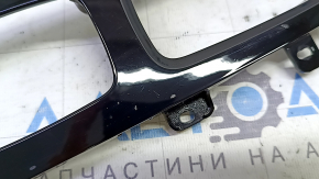 Volvo XC60 22-25 center console trim, glossy black with chrome, scratches