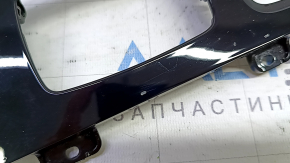 Volvo XC60 22-25 center console trim, glossy black with chrome, scratches
