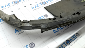 The rear bumper lip of the Audi A4 B8 13-16 restyling sedan, S-Line, gray, is broken, melted, and has scratches.