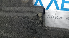 The left underbody protection of the Audi A4 B8 08-16 is large, scuffed, and torn.