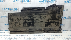 The left underbody protection of the Audi A4 B8 08-16 is large, scuffed, and torn.