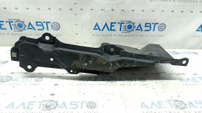 The right side engine guard of a Toyota Prius 50 16-18 is worn and torn.